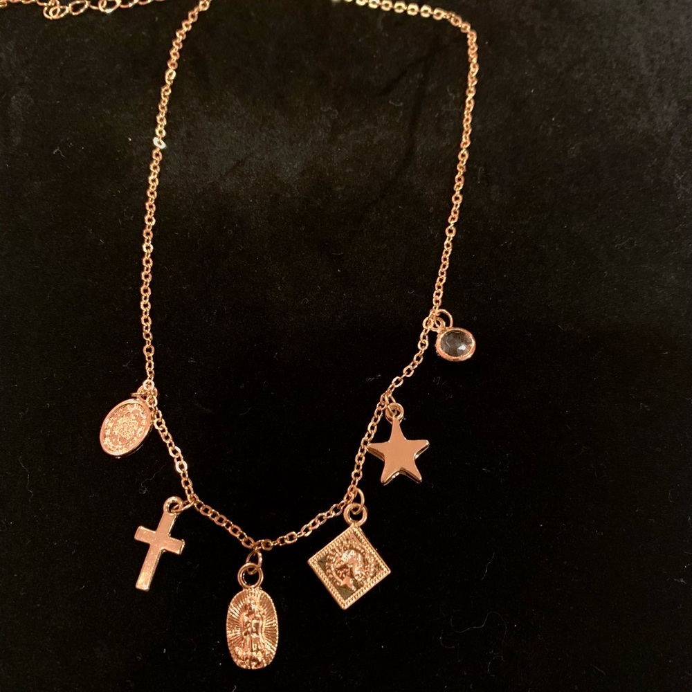 Gold cross necklace with star and crystal